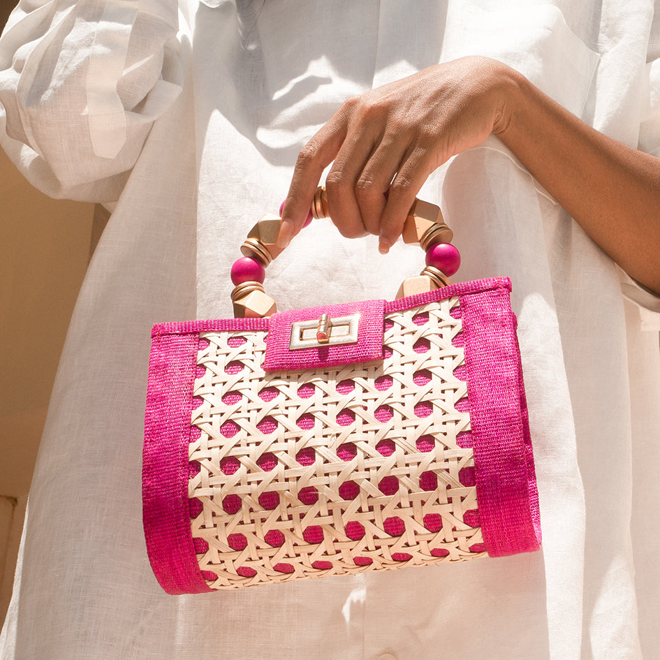 THE MILA Pink & Gold Rattan Woven Handbag
