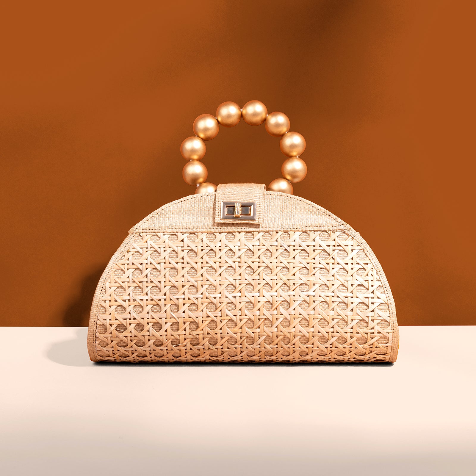 THE ISABELLA Tan Rattan Solihiya Weave and Gold Bead Top Handle