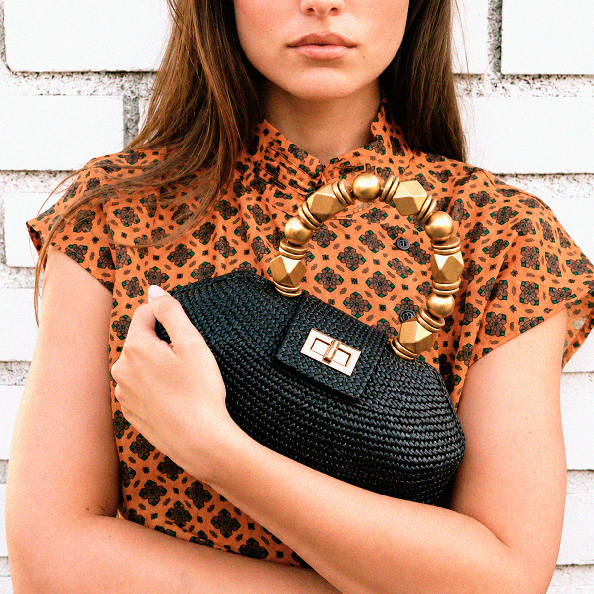 THE MELIA — Black Woven Straw Clutch with Beaded Top Handle