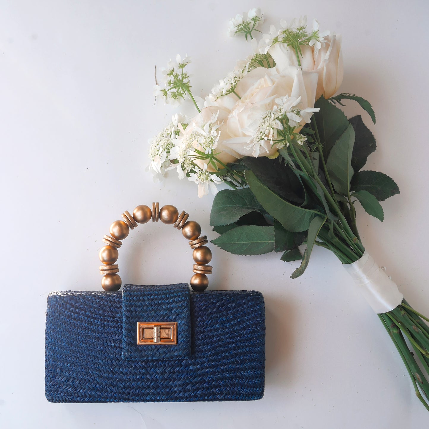 THE SERENA Blue Woven Straw Clutch Bag