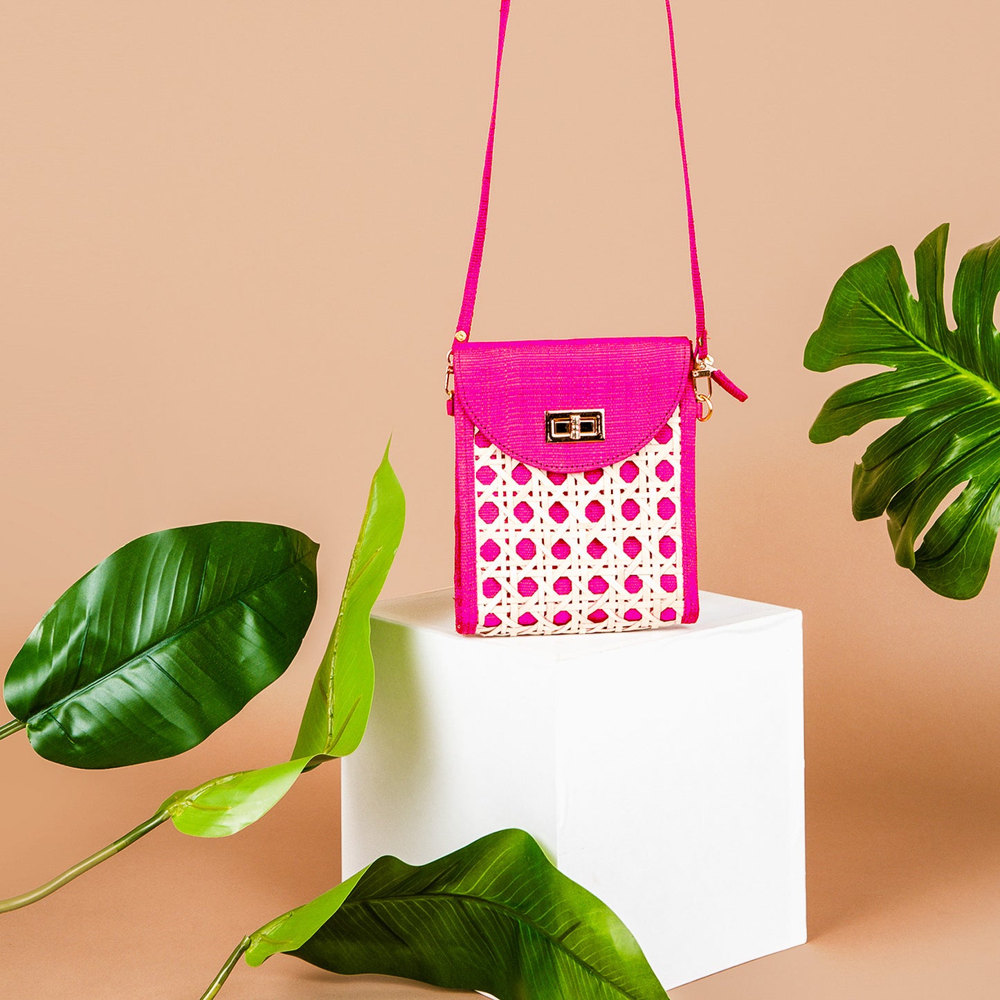 THE ELLIE Pink Rattan Woven Crossbody Bag
