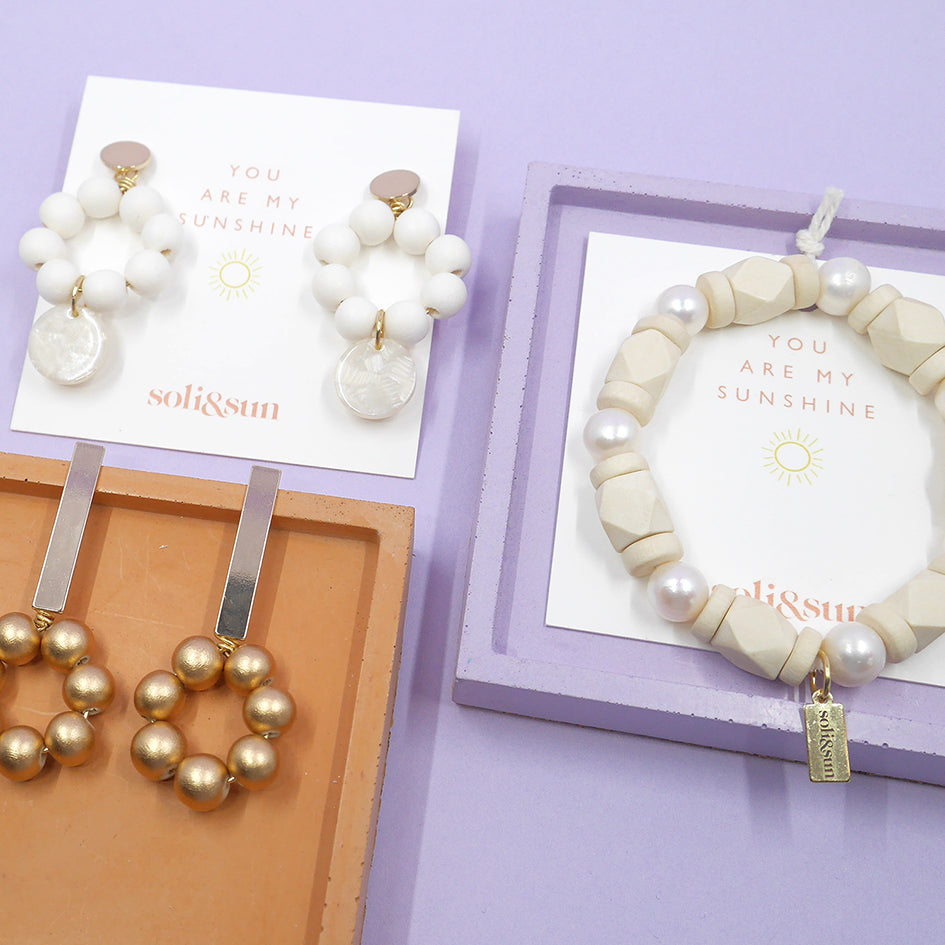THE MILLY White Wooden Bead & Pearlized Charm Earrings