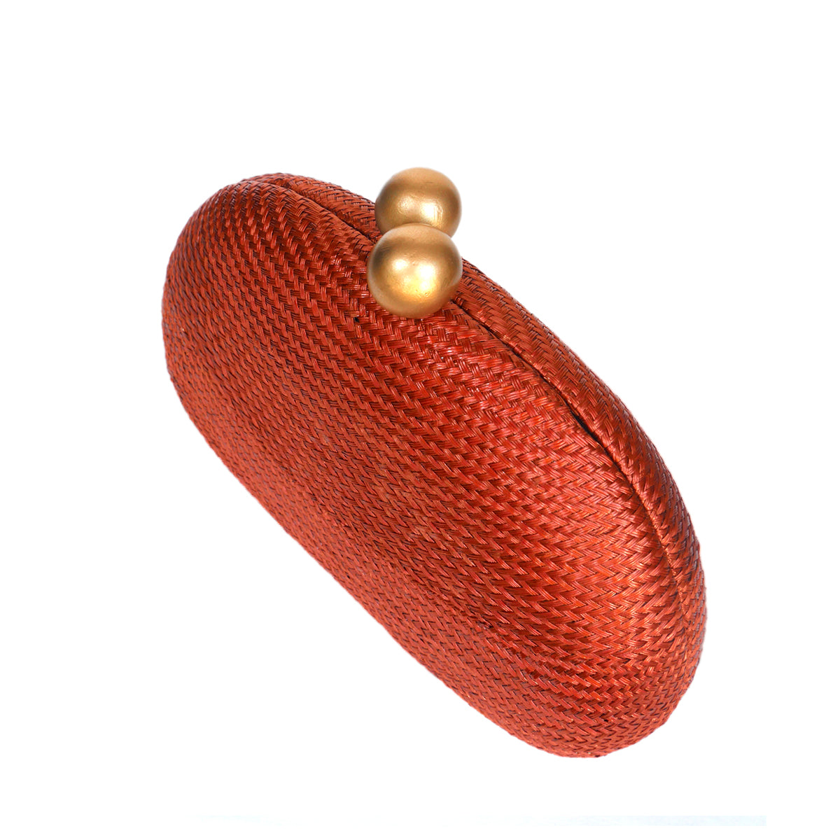 A textured woven clutch bag in a rust-orange color, featuring a gold-tone metal clasp with two round beads, set against a plain white background.