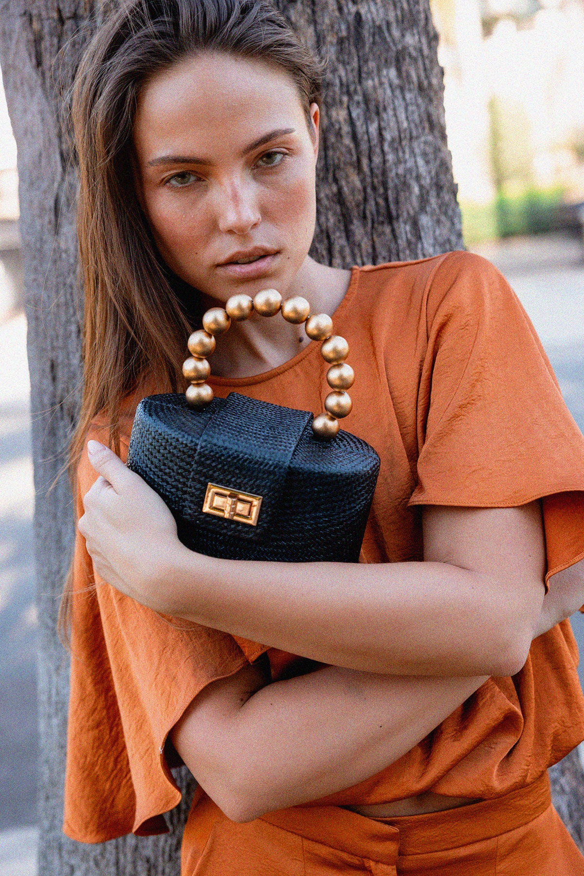 THE OLIVIA — Black & Gold Woven Straw Top-Handle Bag with Beaded Handle