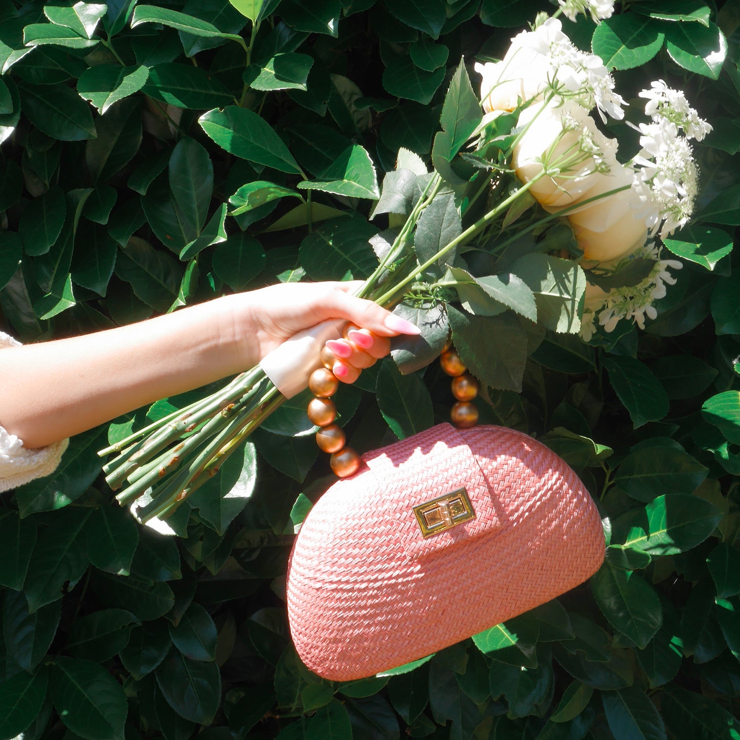 THE ORLA Light Pink Woven Straw & Gold Bead Statement Clutch Bag