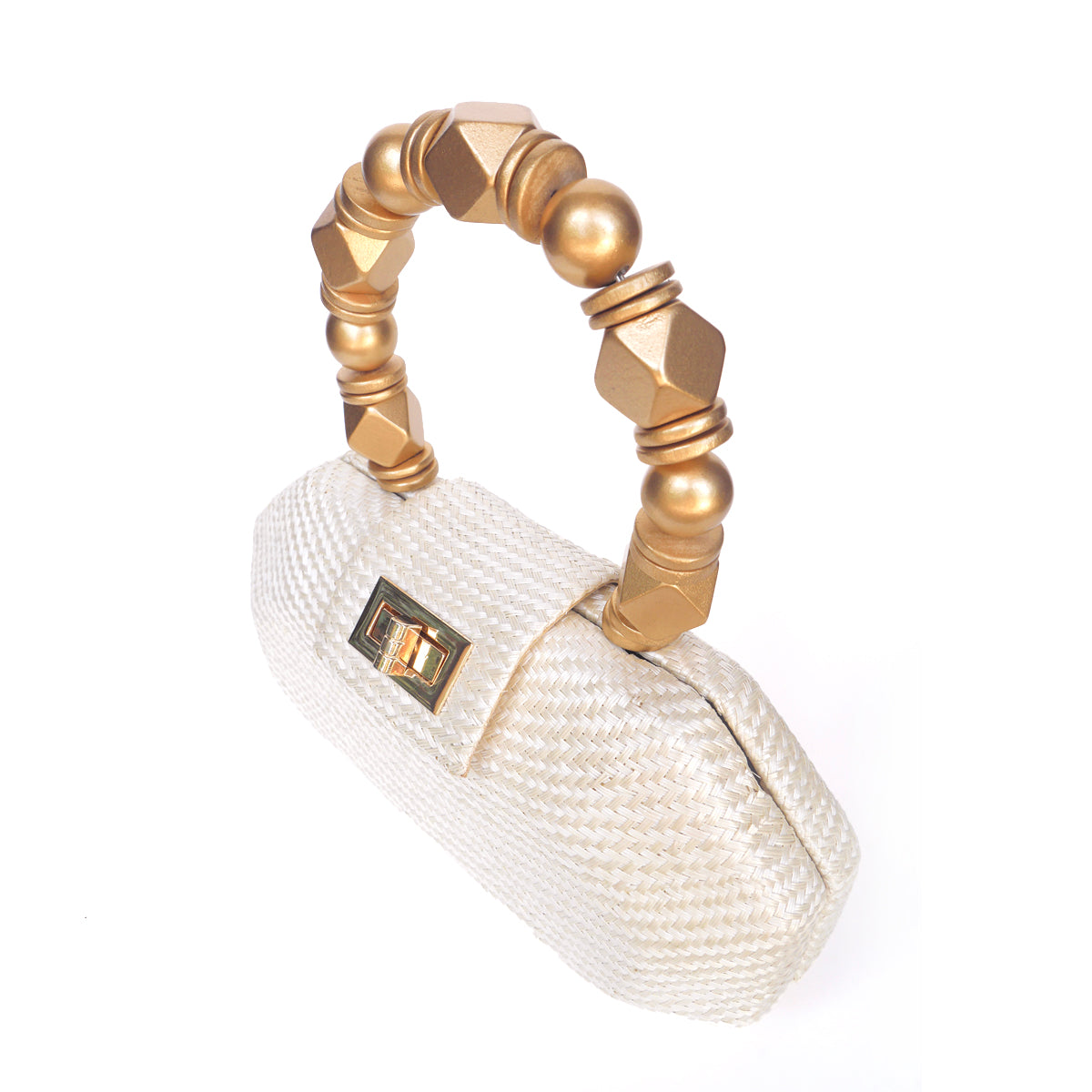 The Melia cream clutch shown from above, showing the gold beaded handle and turn-lock clasp