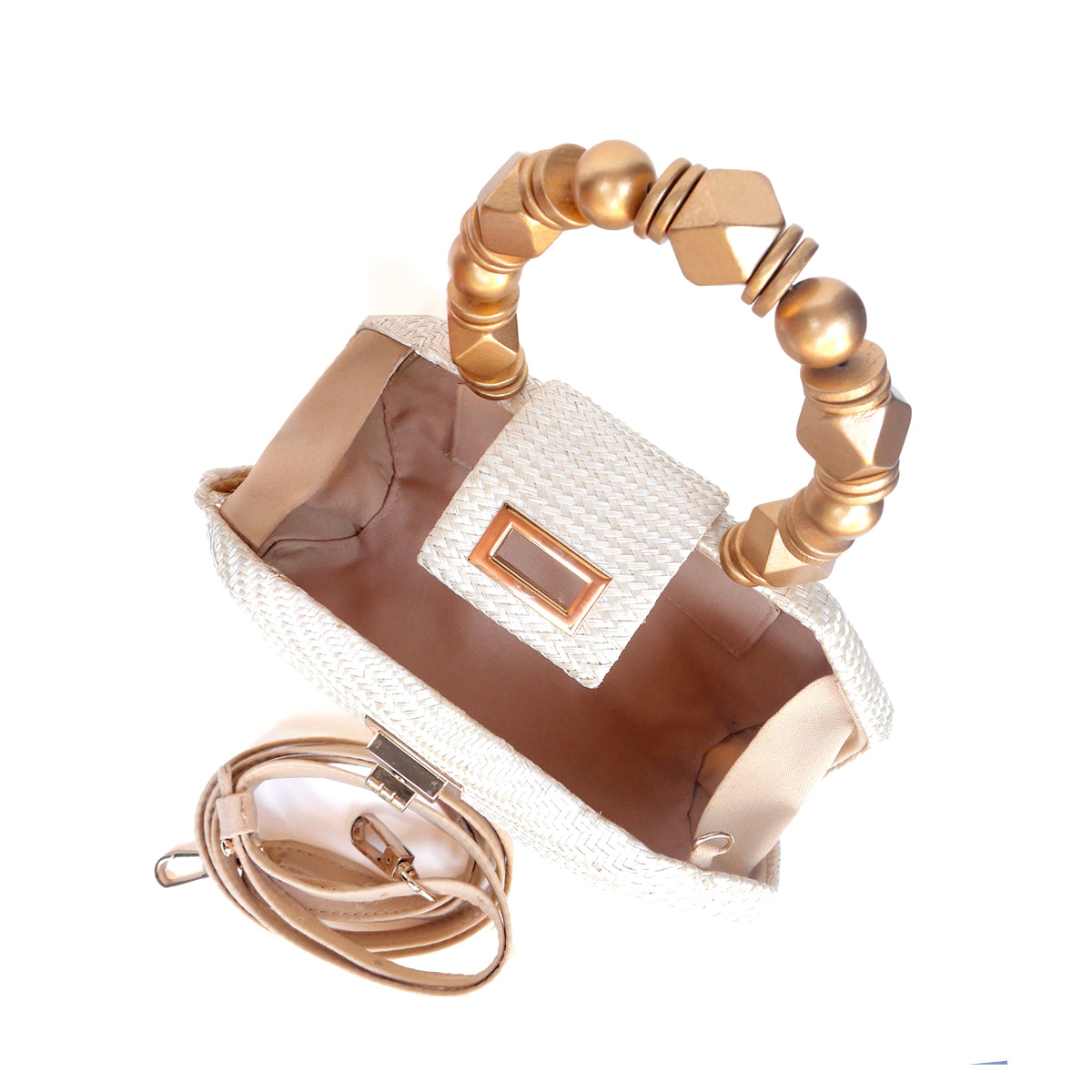 The Melia cream bag open, showing lined interior and detachable crossbody strap