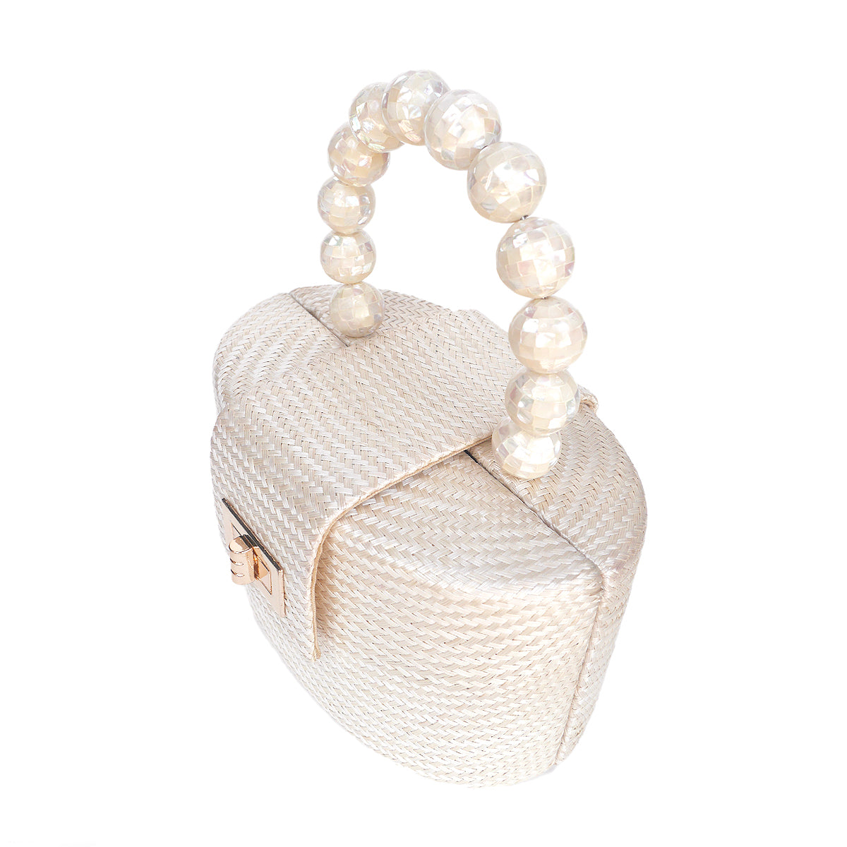 A small heart-shaped handbag with a textured woven body, a curved top handle made of faceted pearl-like beads, and a small gold-tone clasp on the front, shown on a plain white background.