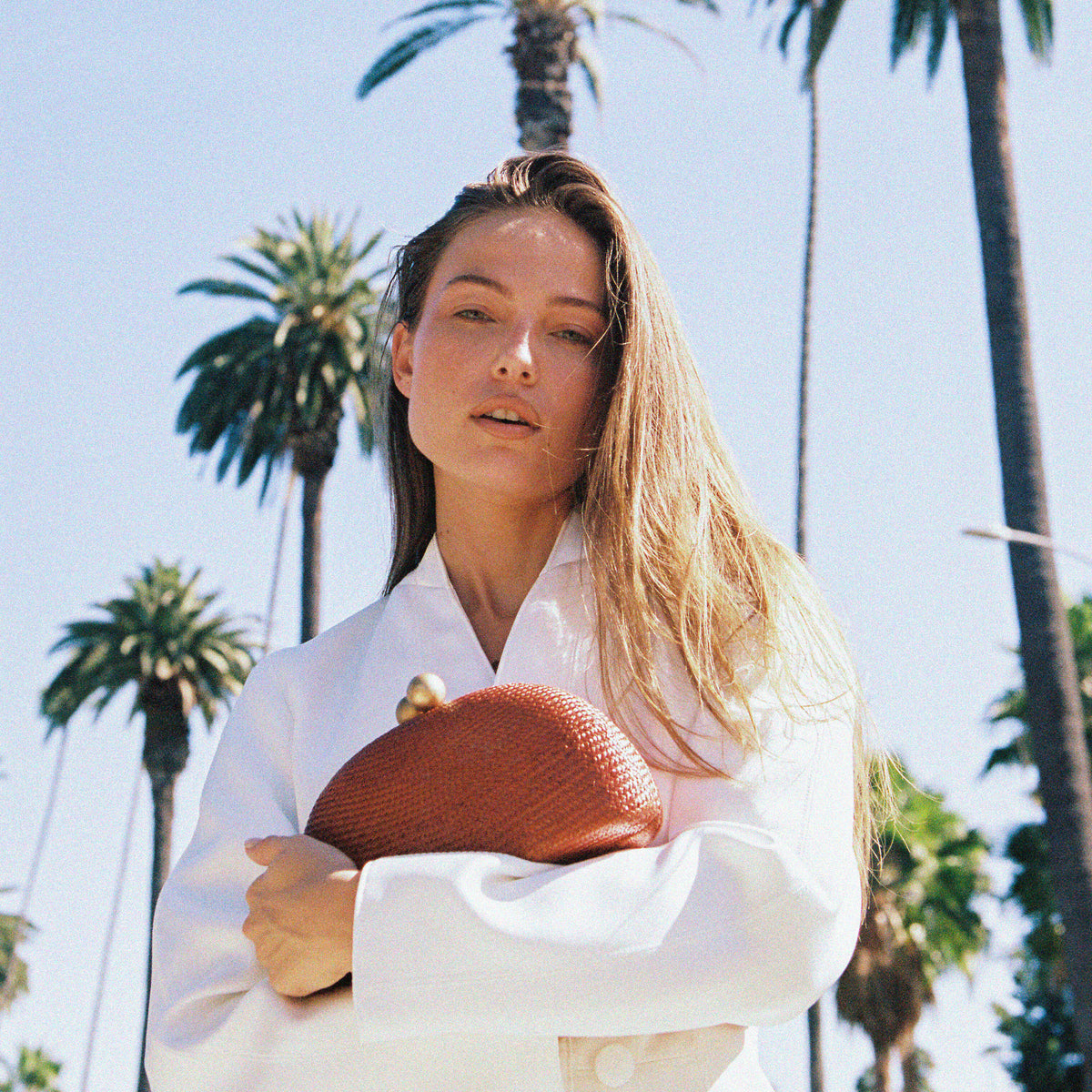 THE HELENA — Terracotta Woven Straw Clutch with Gold Ball Clasp