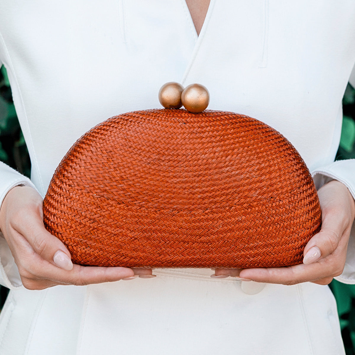 THE HELENA — Terracotta Woven Straw Clutch with Gold Ball Clasp