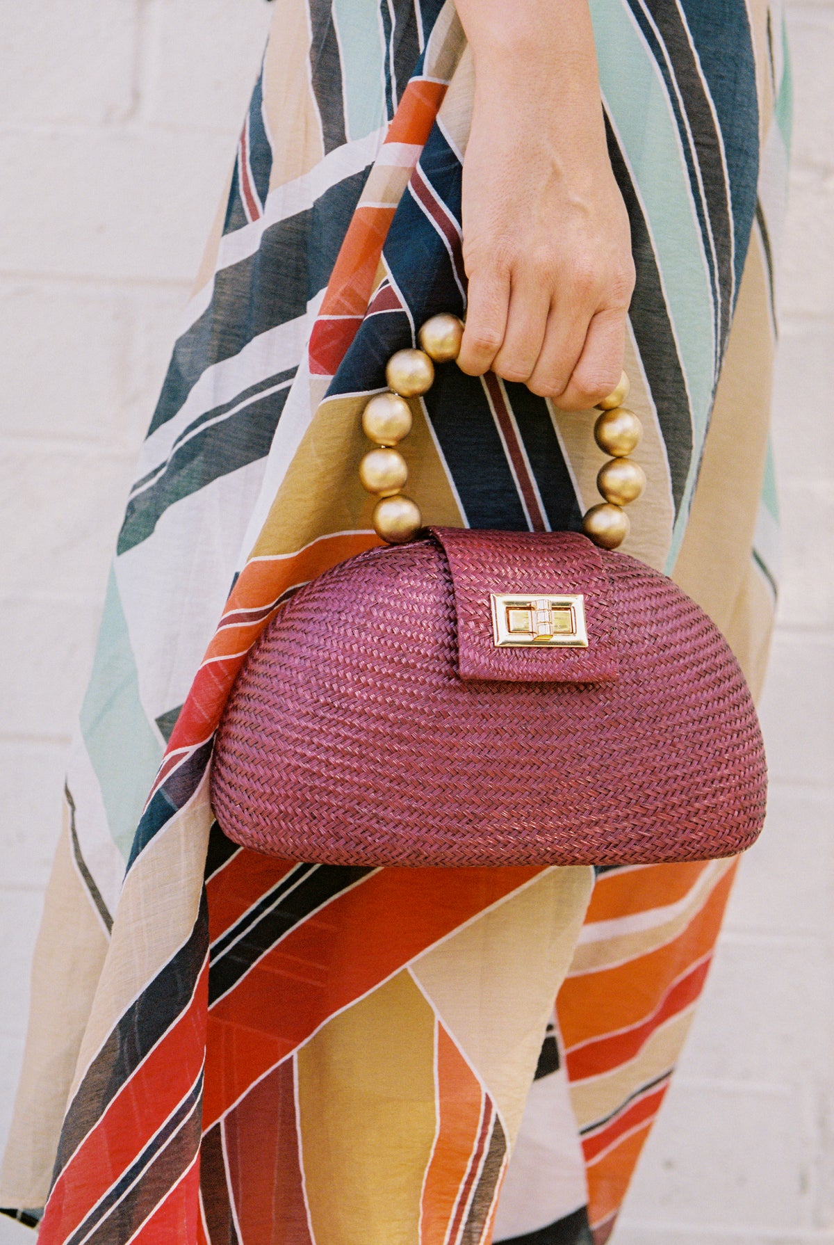 THE ORLA — Maroon Woven Straw Half-Moon Bag with Gold Beaded Handle